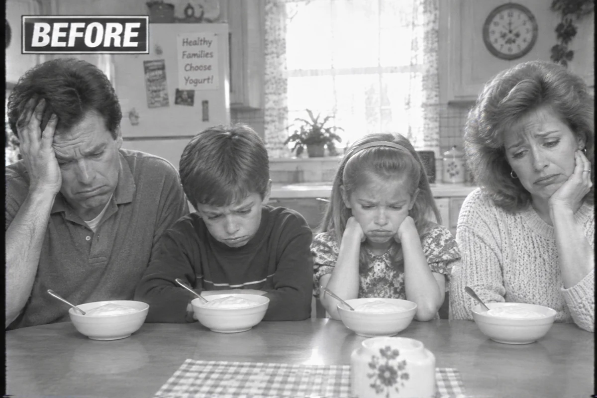 The same family staring sadly at plain, unsprayed yogurt